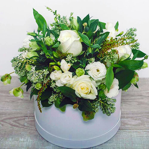 Lovely simple hatbox of greens and whites